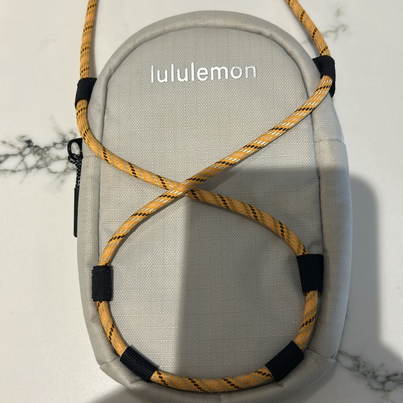 Lululemon Small Purse with adjustable strap. - Picture 4 of 6